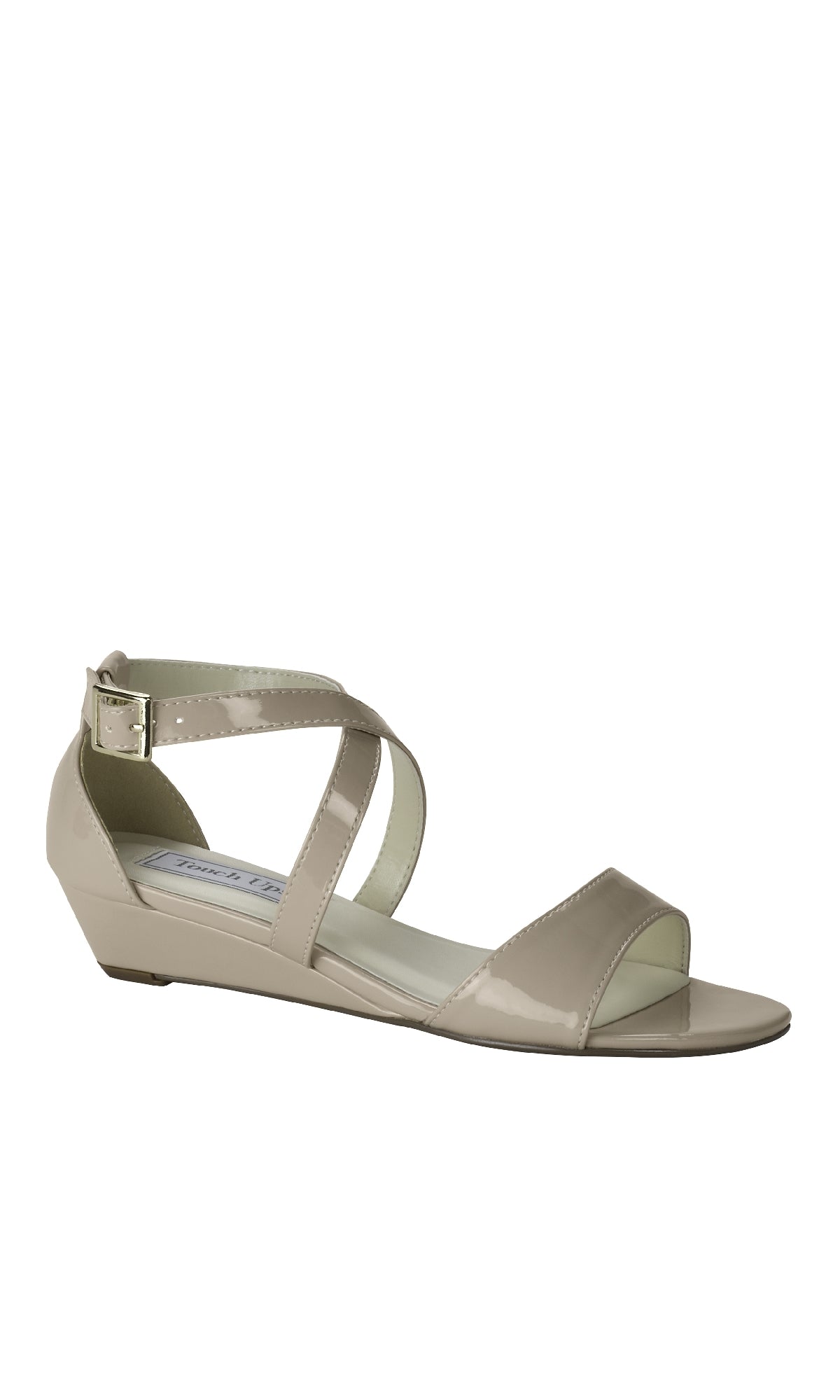 Shyla Nude Wedge Prom Shoes: Touch Ups 4224 feature beige patent leather, a low open-toe wedge heel, ankle strap, and side buckle closure, shown on a white background.